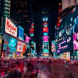 Advertising banners at night in Times Square